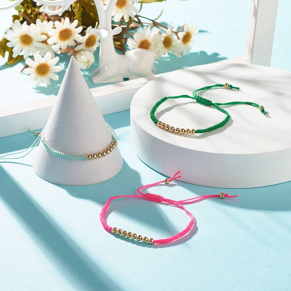 Bracelet cordon tressé et perle doré amitié