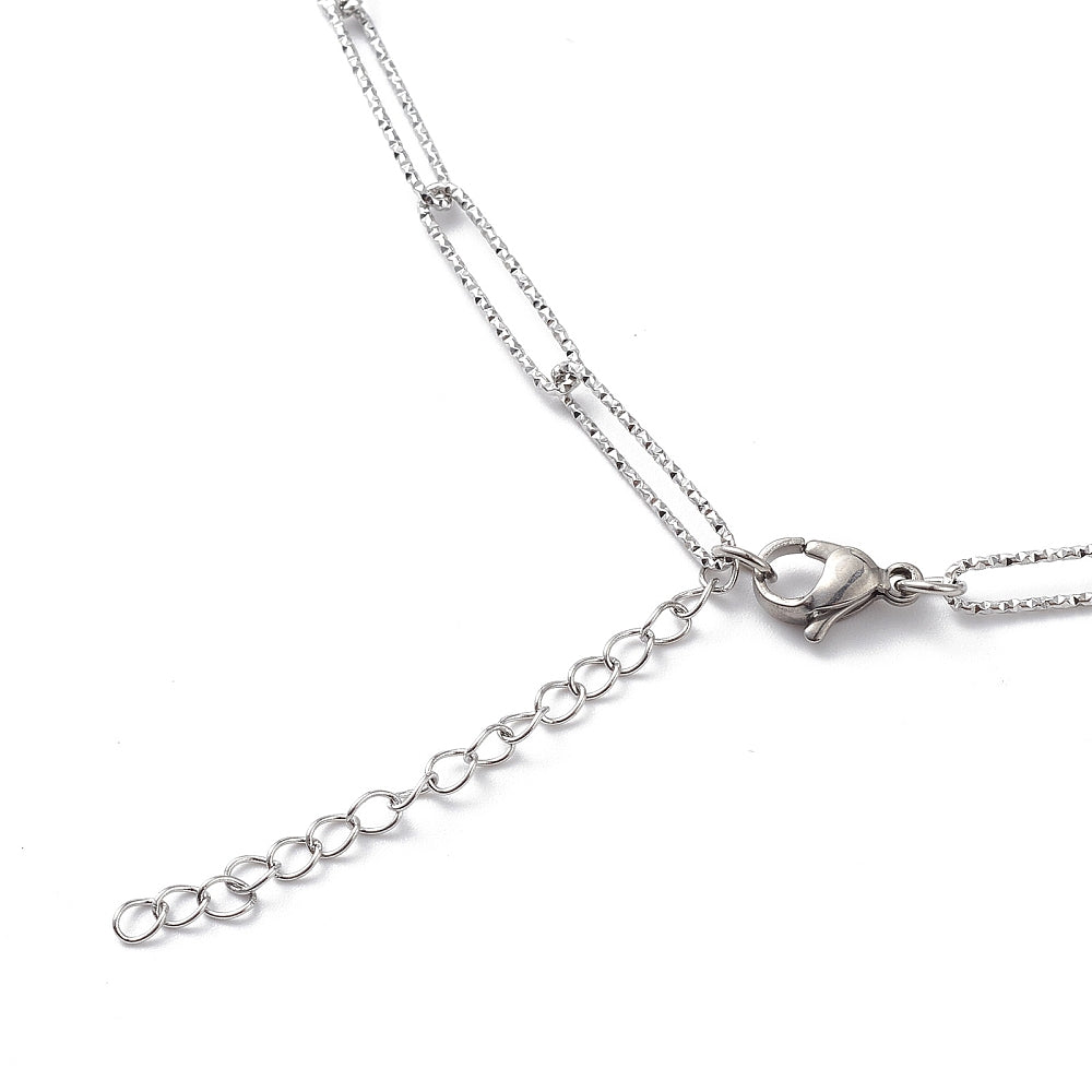 Collier acier inoxydable maille thrombone longue pailleté