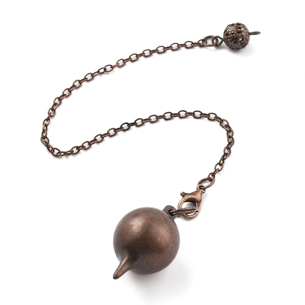 Pendule boule en laiton