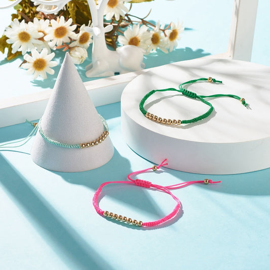Bracelet cordon tressé et perle doré amitié