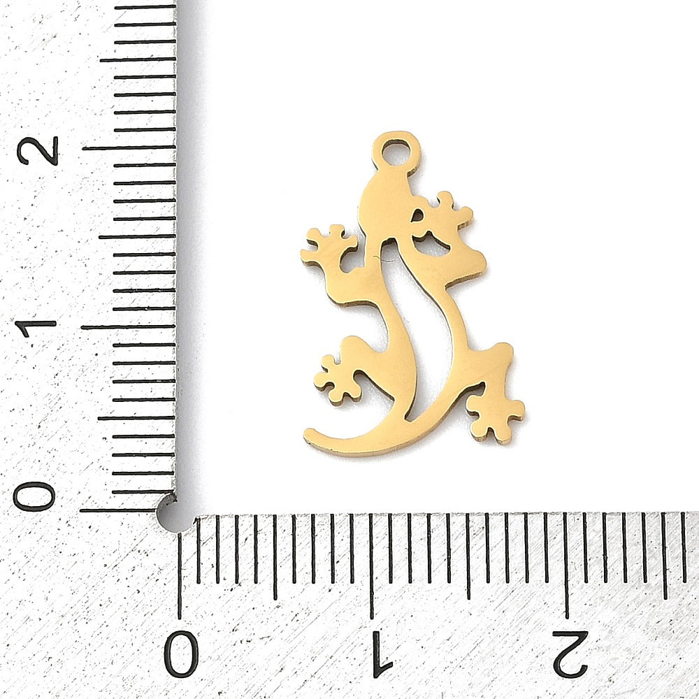 Pendentif gecko acier or