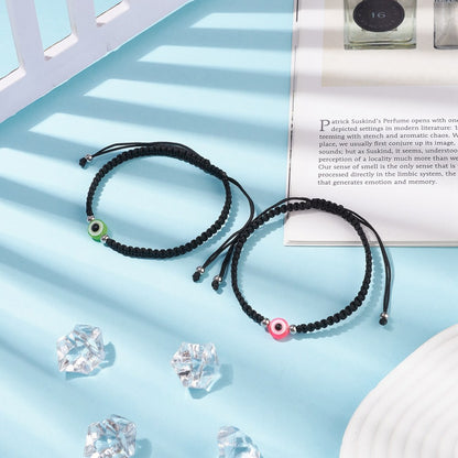Bracelet cordon noir et protection mauvais œil couleurs diverses