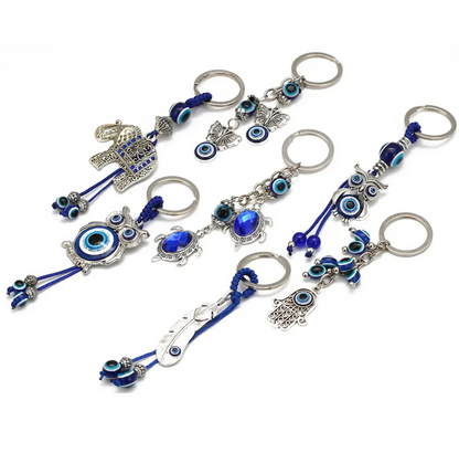 Porte clé protection mauvais œil amulette diverse forme