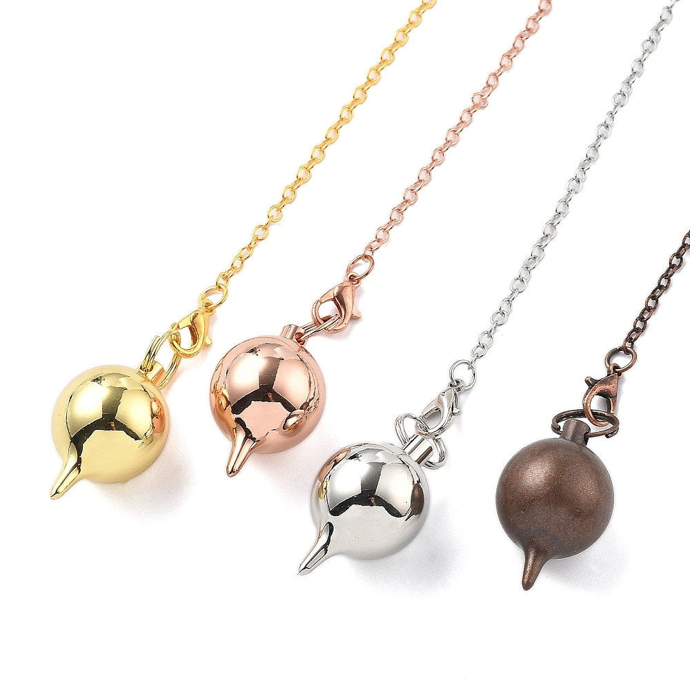 Pendule boule en laiton