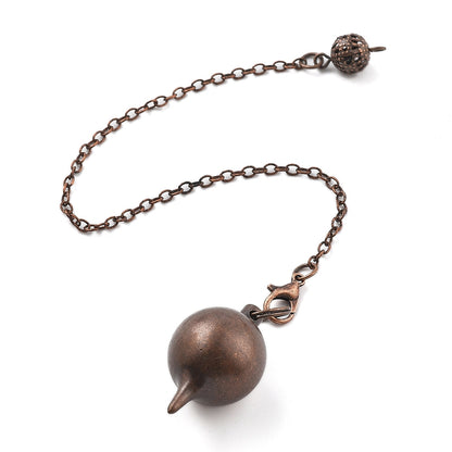 Pendule boule en laiton