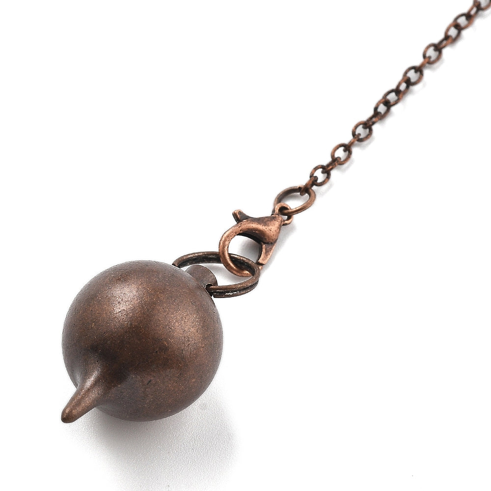Pendule boule en laiton