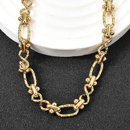 Collier acier inoxydable maille articulé or