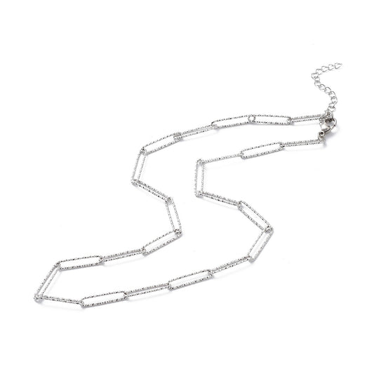 Collier acier inoxydable maille thrombone longue pailleté